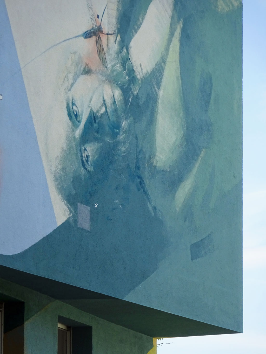 Mural in Frankfurt-Heddernheim thematisiert mit einigen Tieren und Herbert Spencer dessen Ausdruck Survival of the fittest