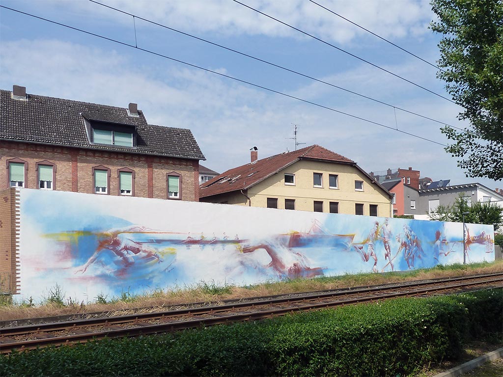 40 m breite Wand mit Sportmotiven zu Fußball, Hockey, Radfahren, Rudern, Schwimmen und Tennis